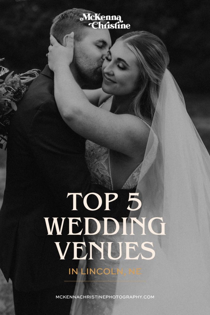 Black and white photo of couple sharing an embrace with groom kissing bride on the cheek; image overlaid with text that reads Top 5 Wedding Venues in Lincoln, NE